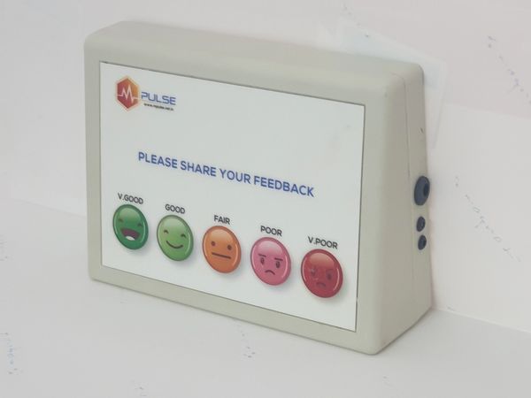 Customer feedback device with 5 smileys
