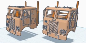 3D models of two truck cabs with detailed features and orange interiors.