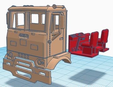 3D model of a truck cabin and a red interior cockpit.