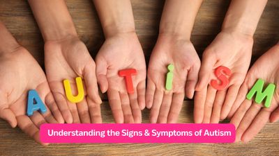Hands holding colorful letters spelling 'AUTISM'.