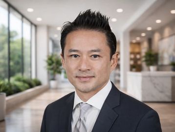 Professional man in suit at modern office.