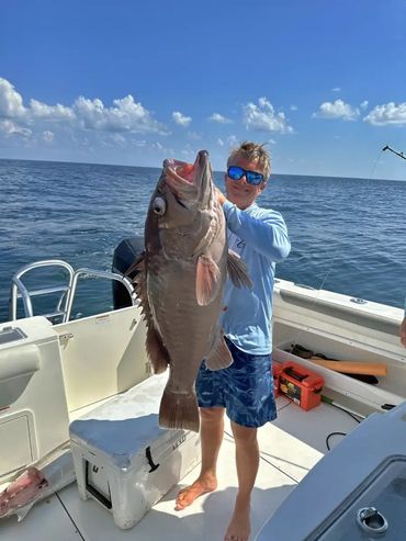 his Snowy Grouper was caught on a 6 oz. Barefoot Jig by S. Bassett.