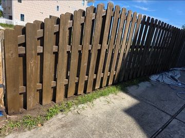 Fencing job with brown stained wood in Virginia Beach. New fence. Like Hercules Fence. Fence Repairs