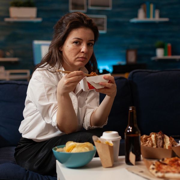 A woman binge eating