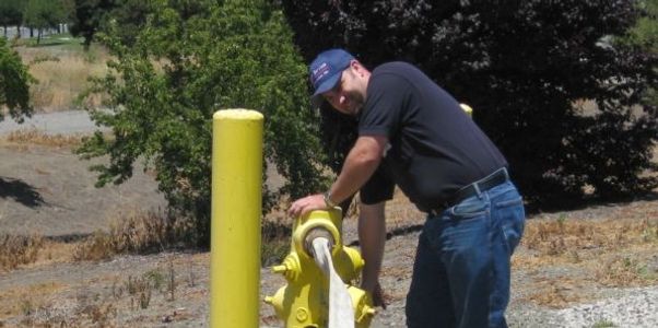 Inspecting a fire hydrant