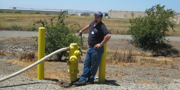Inspecting a fire hydrant