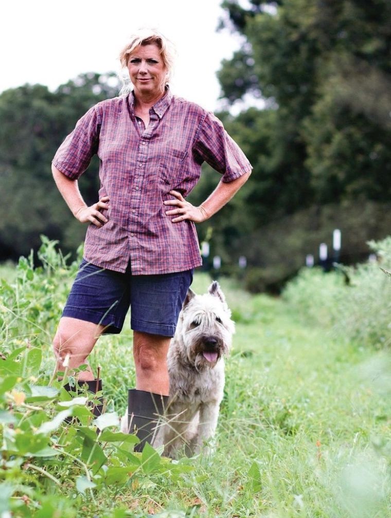 Really old picture of me but I like it!farmer in field with dog
