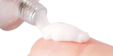 TKTX numbing cream tube with white cream oozing out