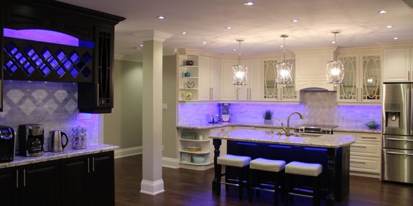Moden kitchen with purple under cabinet lighting