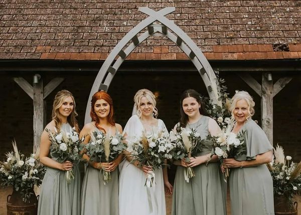 Bride and bridesmaids with their beautiful bouquets 