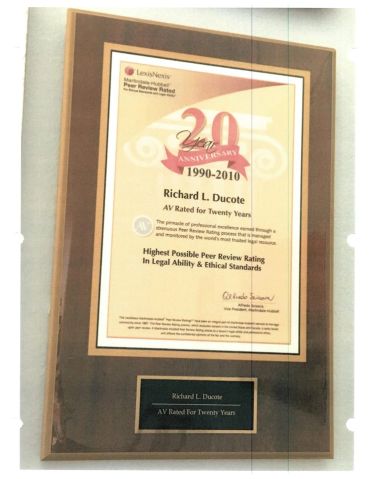 Award plaque for Richard L. Ducote's 20 years AV rating.