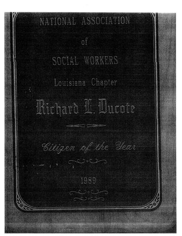 Plaque honoring Richard L. Ducote as Citizen of the Year 1989.