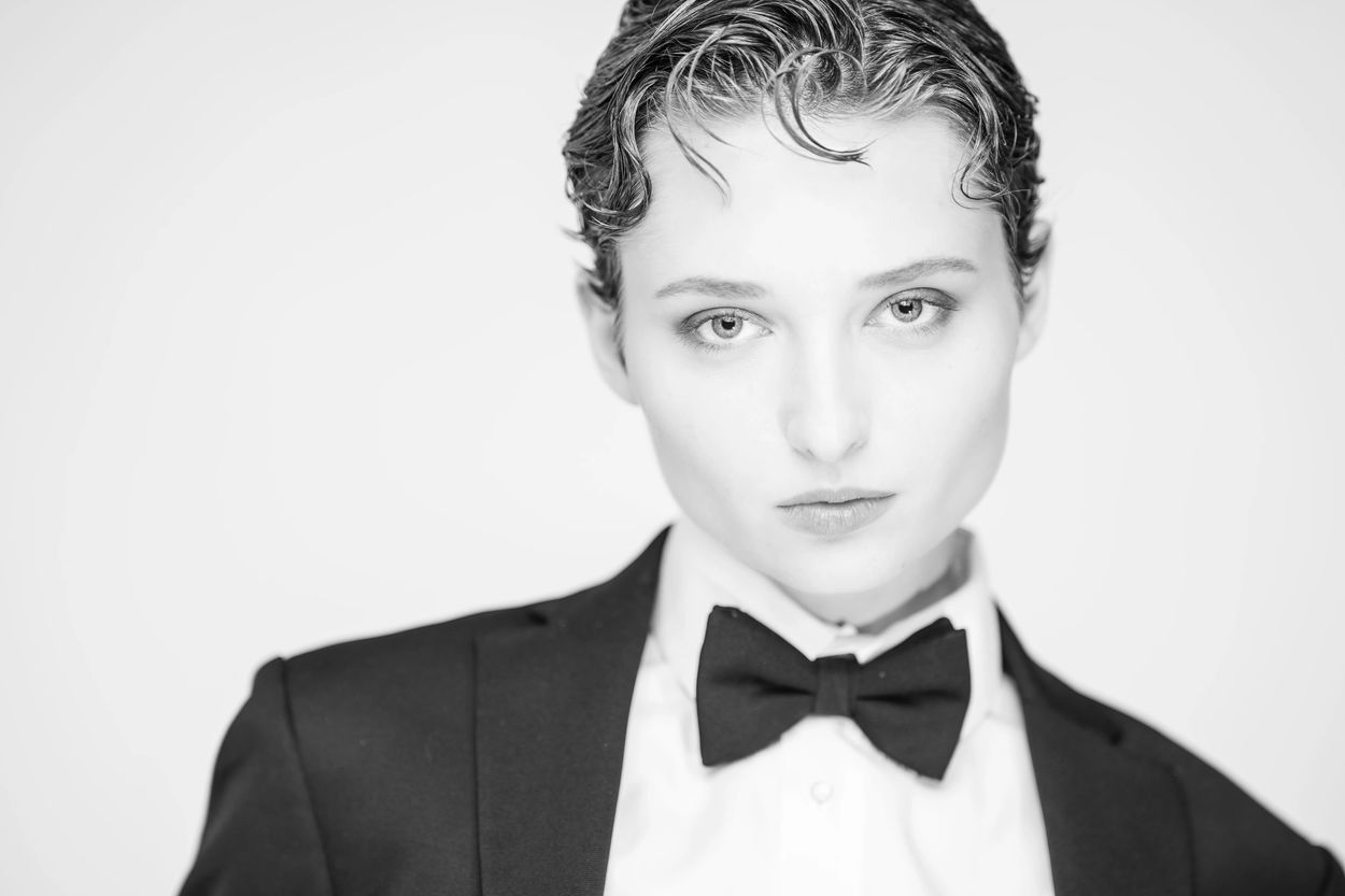 Katie Hopwood in Calvin Klein Tuxedo for Jos A. Banks campaign pitch