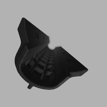 Black curved industrial object on gray background.