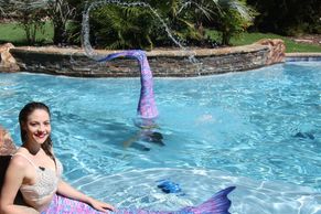 Aquatic performers as mermaids for water safety video