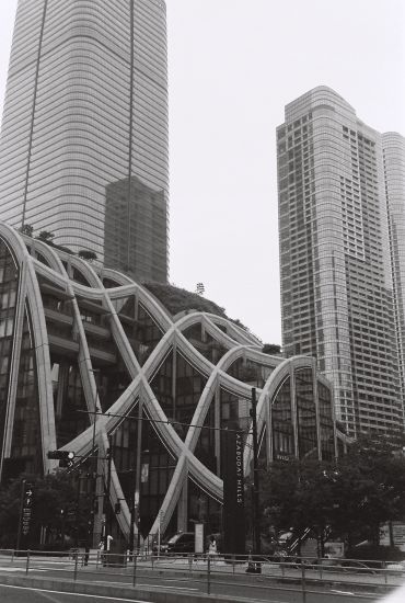 Modern city buildings with unique architectural design.