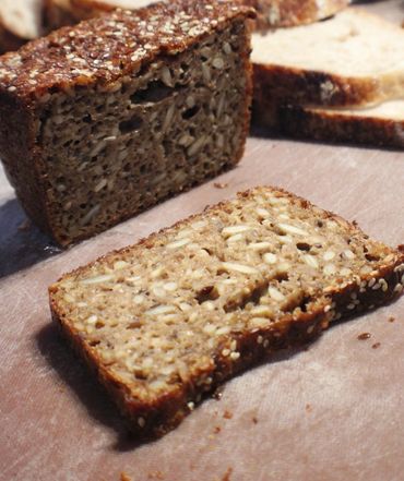Slices of seeded whole grain bread.