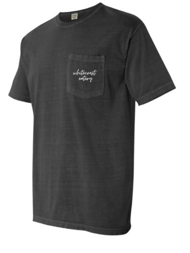 Black t-shirt with a front pocket featuring white text.