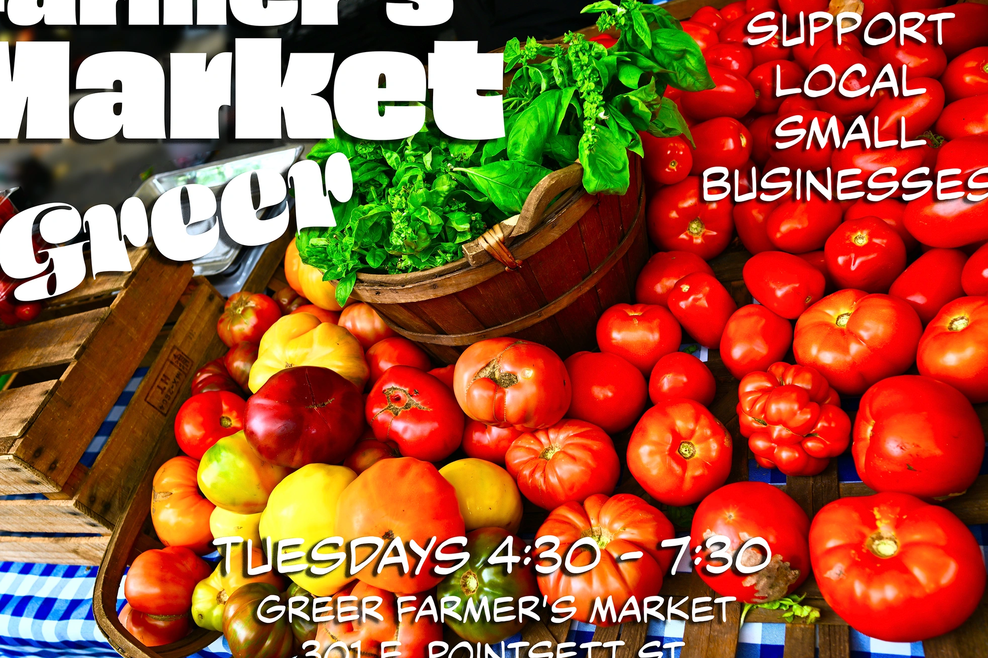 Colorful tomatoes and fresh greens at Greer Farmer's Market promoting local business support.