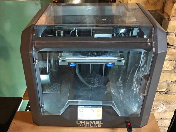 3D Printer printing a part prototype or product
