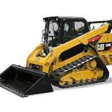 Yellow Caterpillar tracked skid steer loader with front bucket.
