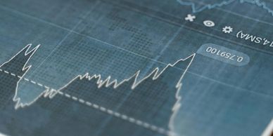 Graph showing fluctuating data trends on a digital interface.
