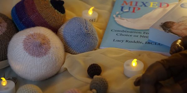 Books and teaching aids for mixed feeding antenatal class. breast and bottle feeding.