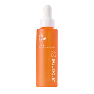 Orange bottle of Arbonne Derm Results serum with vitamin C.