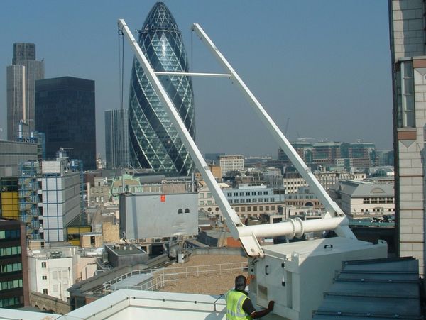 London business center, building roof with workers
