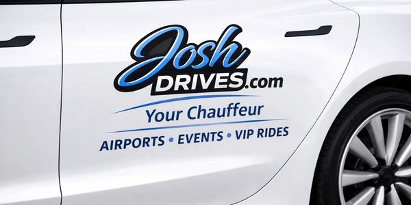 Car door with JoshDrives.com chauffeur service branding.