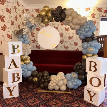 A boy baby shower balloon hoop made with Kalisan balloons.