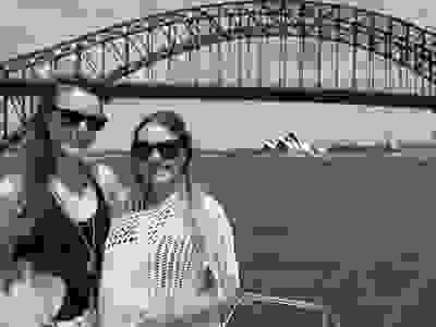 Guests  cruising past Sydney Harbour Bridge
