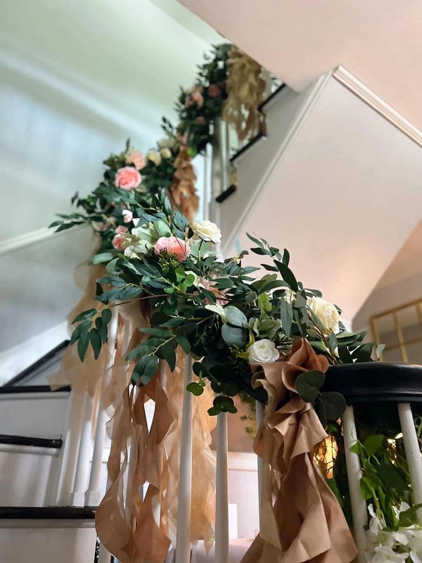 Winding staircase with custom floral arrangement