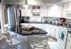 {"blocks":[{"key":"4hnbc","text":"Our farmhouse style kitchen will make you feel right at home as you sip freshly ground locally roasted coffee and dine on one of our deliciously prepared breakfast creations.","type":"unstyled","depth":0,"inlineStyleRanges":[],"entityRanges":[],"data":{}}],"entityMap":{}}