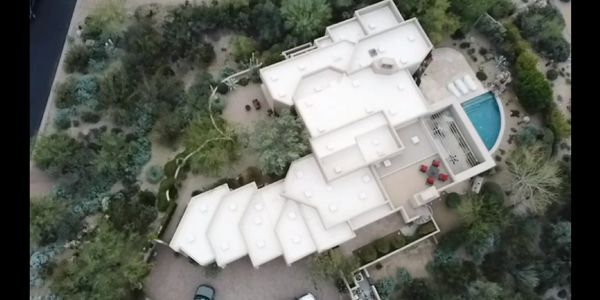 Polyurethane spray foam roof installation and 3 gallons per 100 sq ft of elastomeric roof coating, 