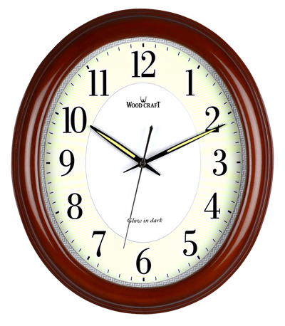 Oval-shaped night glow wooden wall clock. Fitted with a silent sweep movement & it has a brown frame
