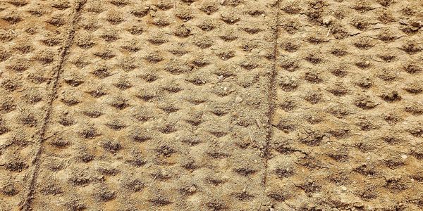 CleanSands M58 electric seeder detail, showing the precision design for fine turfgrass seedbed prepa
