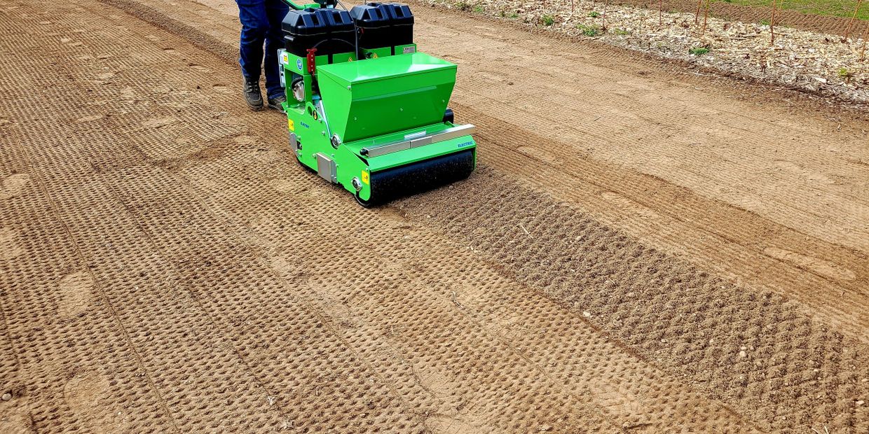 CleanSands M58 all-electric primary turfgrass seeder providing quiet, precise seeding for profession