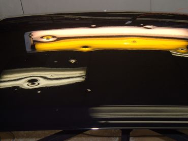 Before and after paintless dent repair on hail damage in Frisco TX