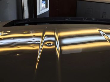 Before and after paintless dent repair on hail damage in Plano TX