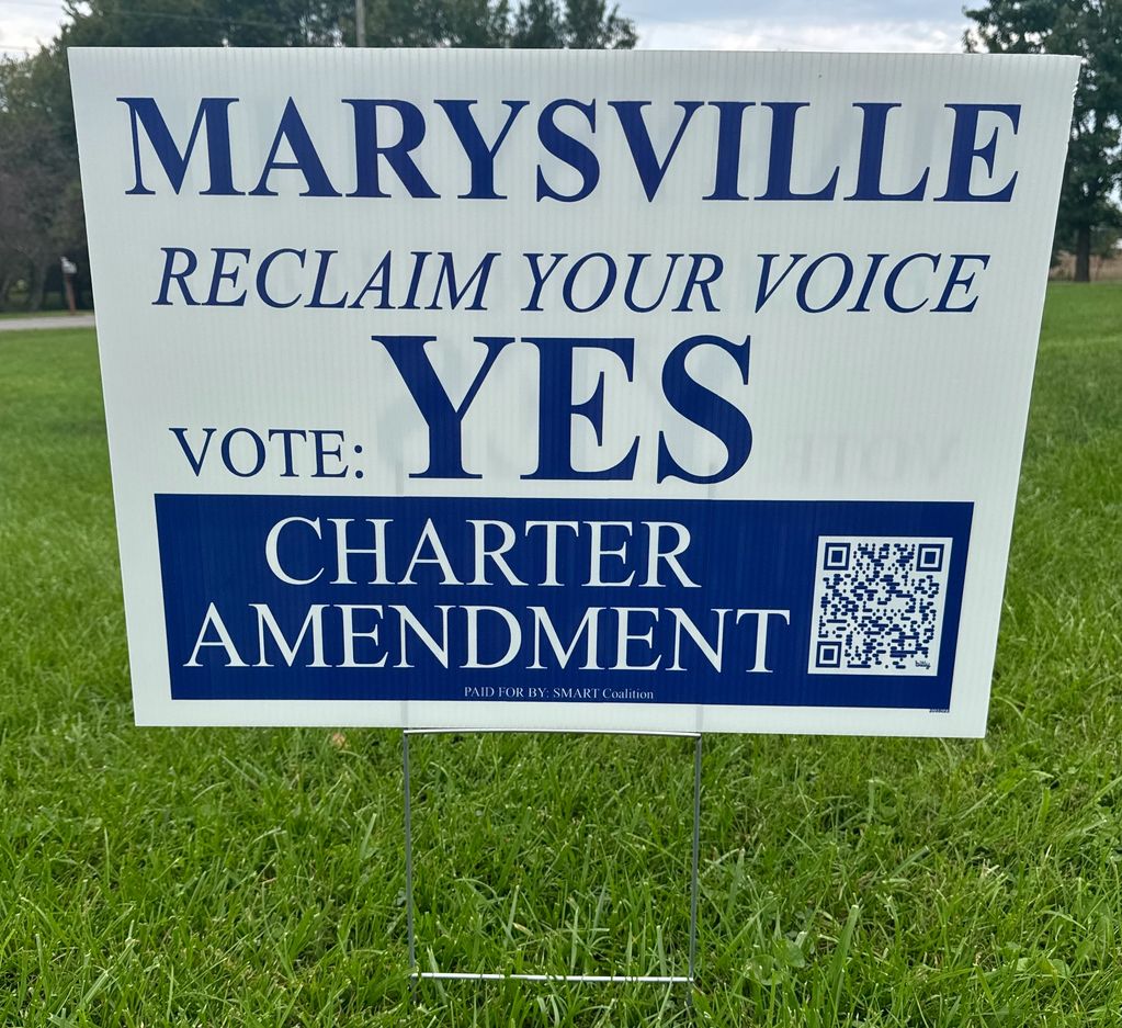 Campaign sign urging Marysville residents to vote yes on a charter amendment.