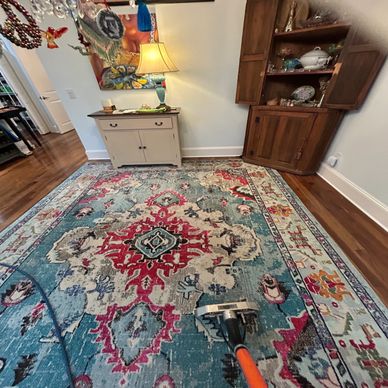 Vibrant area rug after cleaning by Elevation Restoration inside a home in Sapphire NC. 