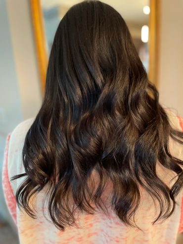 A person with a long wavy hair