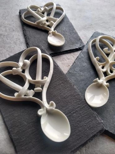 Decorative heart-shaped ceramic spoons.