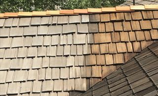 A cedar roof after being pressure washed.  Appropriate pressure washing removes graying and moss
