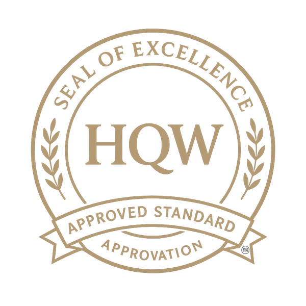 Elegant golden HQW Seal of Excellence with laurel leaves and approval banner.