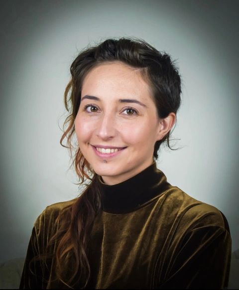 Head and shoulders photo of Haley smiling