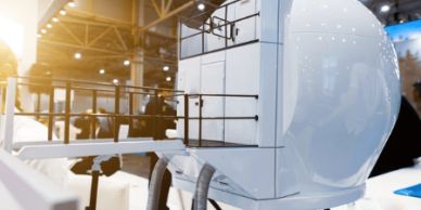 Close-up of futuristic drone or robotic device in a bright indoor setting.