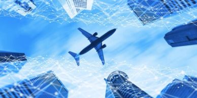 Airplane flying above city skyscrapers with digital network overlay.