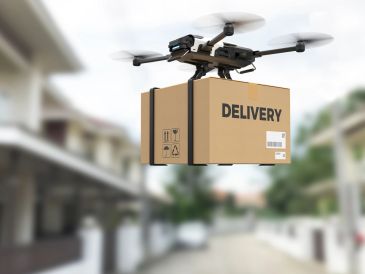 Drone delivering a package labeled DELIVERY.